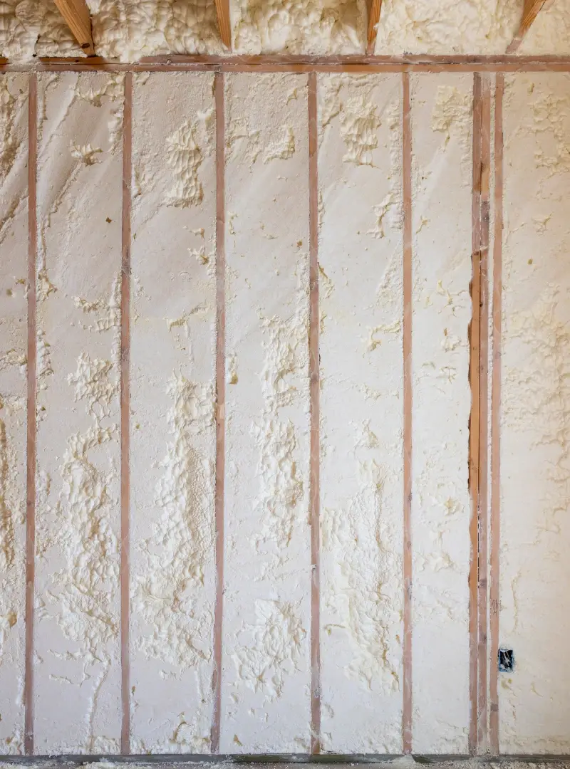 Spray foam insulation filling a wall cavity